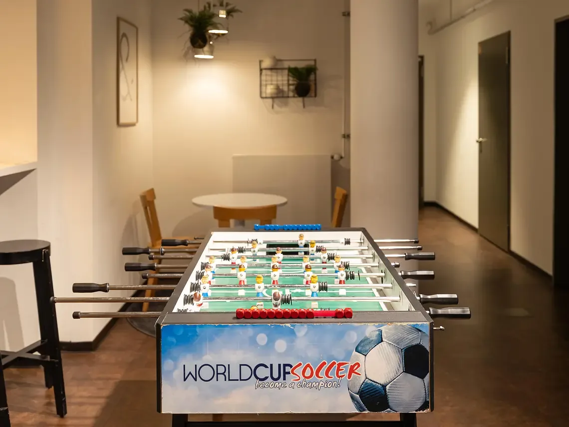 Games room in student accommodation in Hamburg with table football and social area