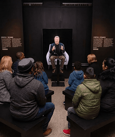 Fisherman casting line on a stormy beach