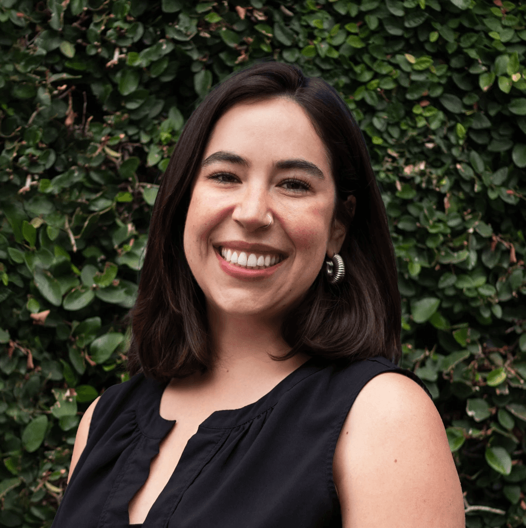 Jada M Thompson in front of a hedge in Los Angeles, California