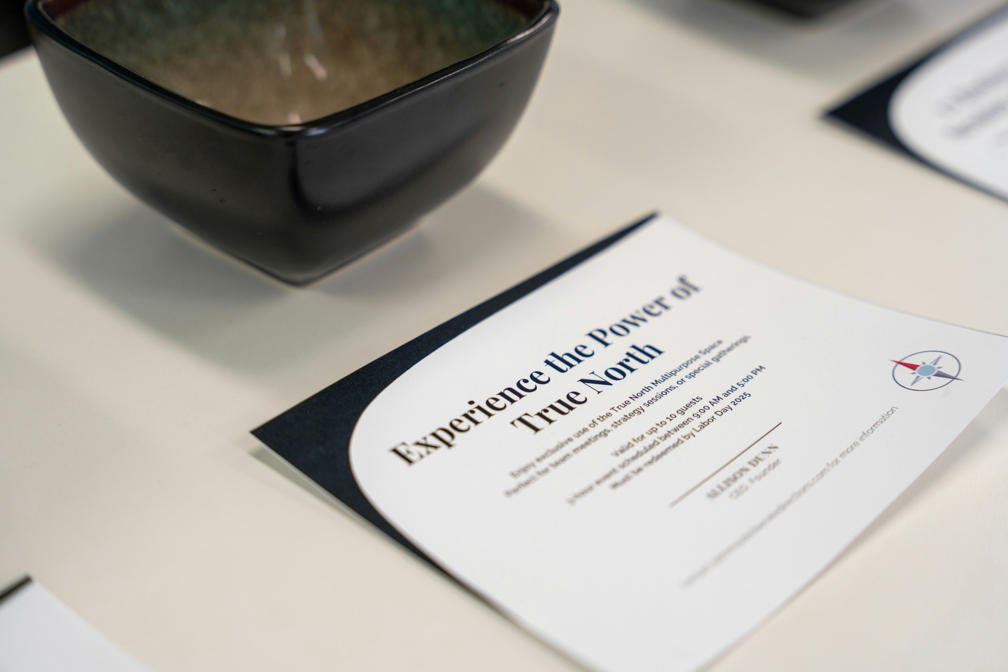 A bowl and paper exhibit "the power of true north."