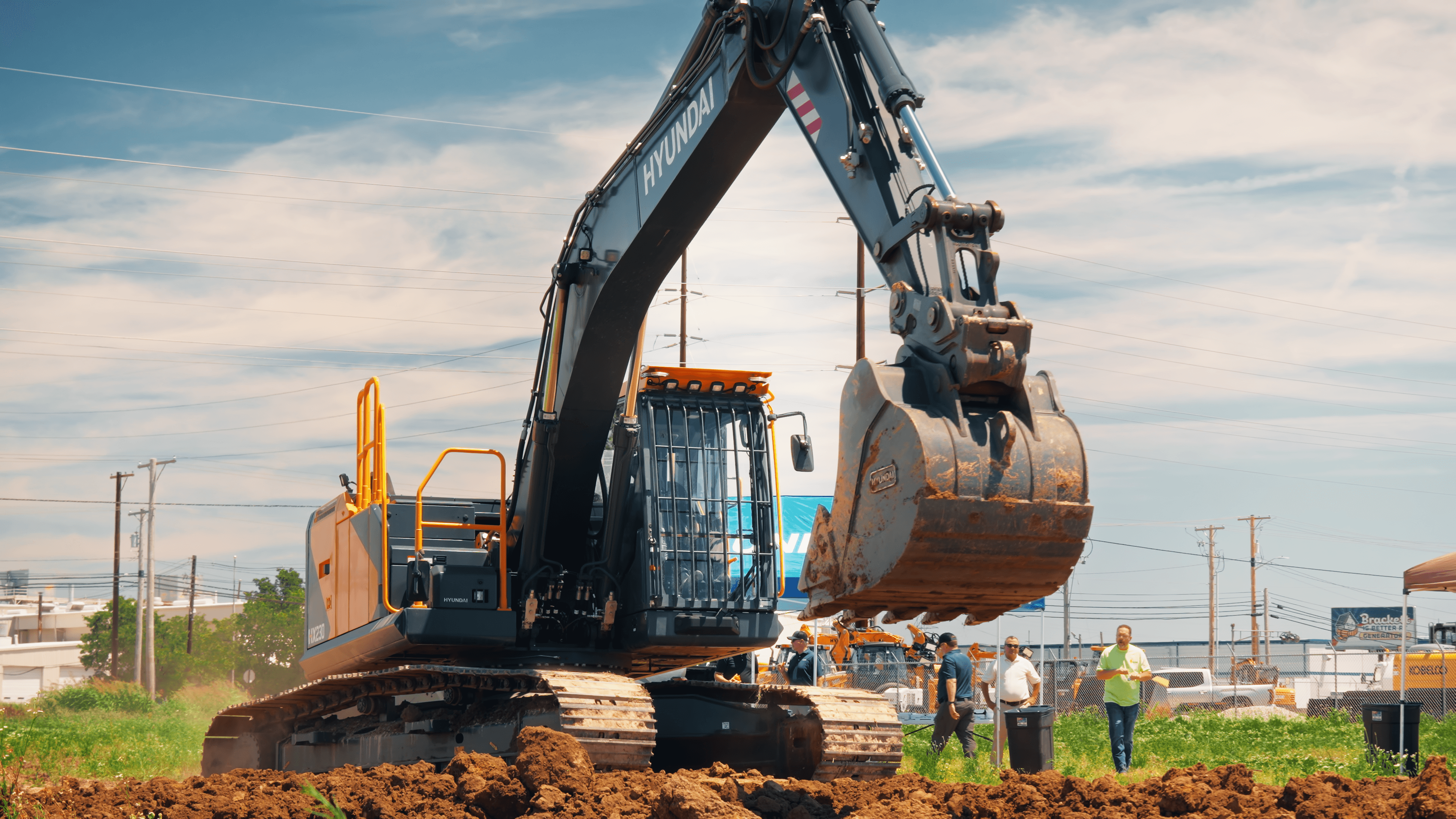 Heavy equipment excavator digging up dirt at a job site in Southern Indiana.