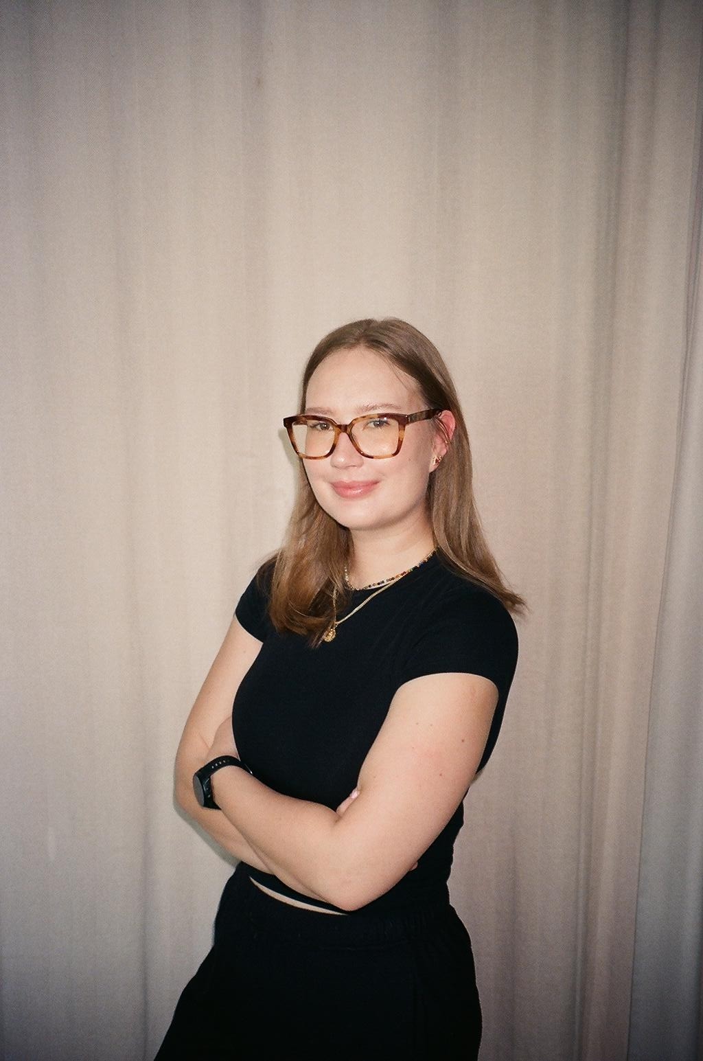 Joanna in a leather jacket smiling