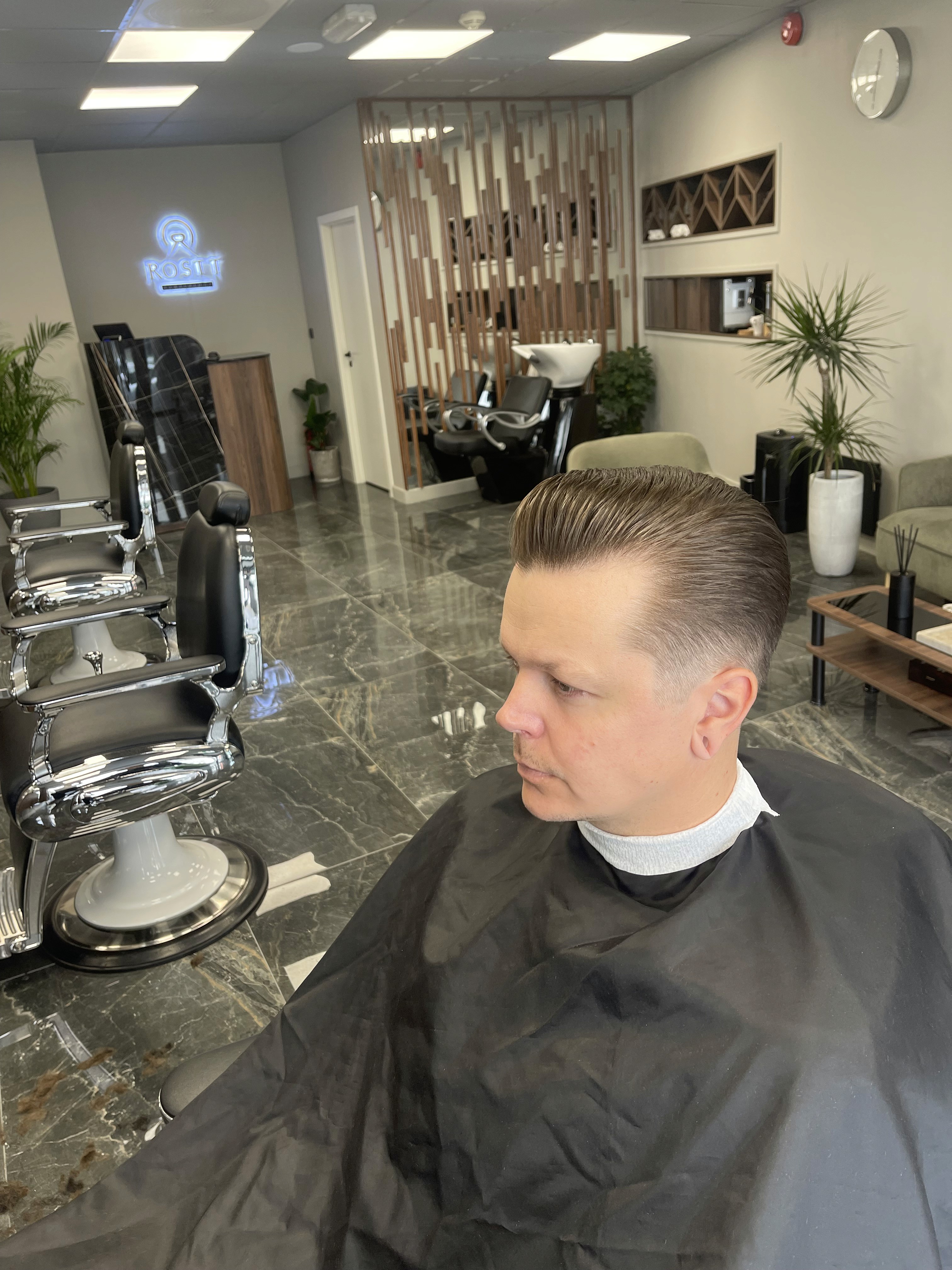 Modern salon interior with marble tiles