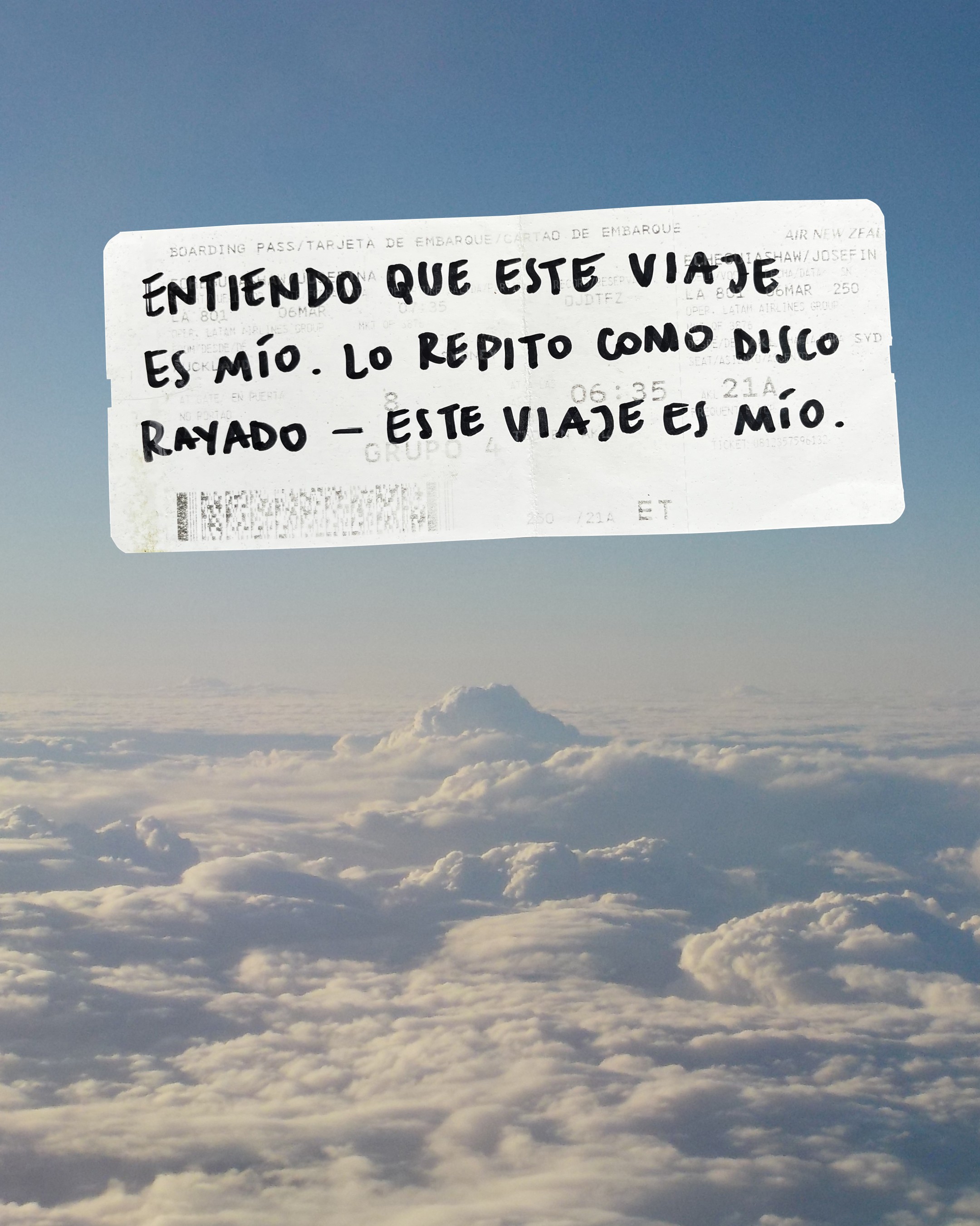 People playing soccer on a rooftop court surrounded by city buildings