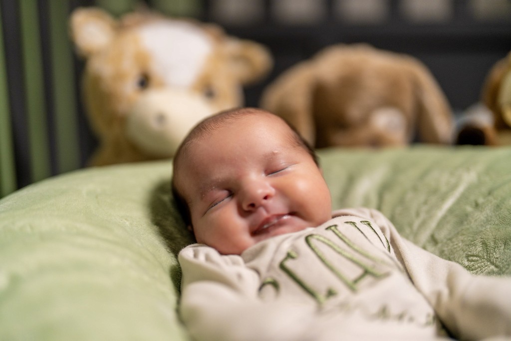 Lava flowing over black and brown rocks