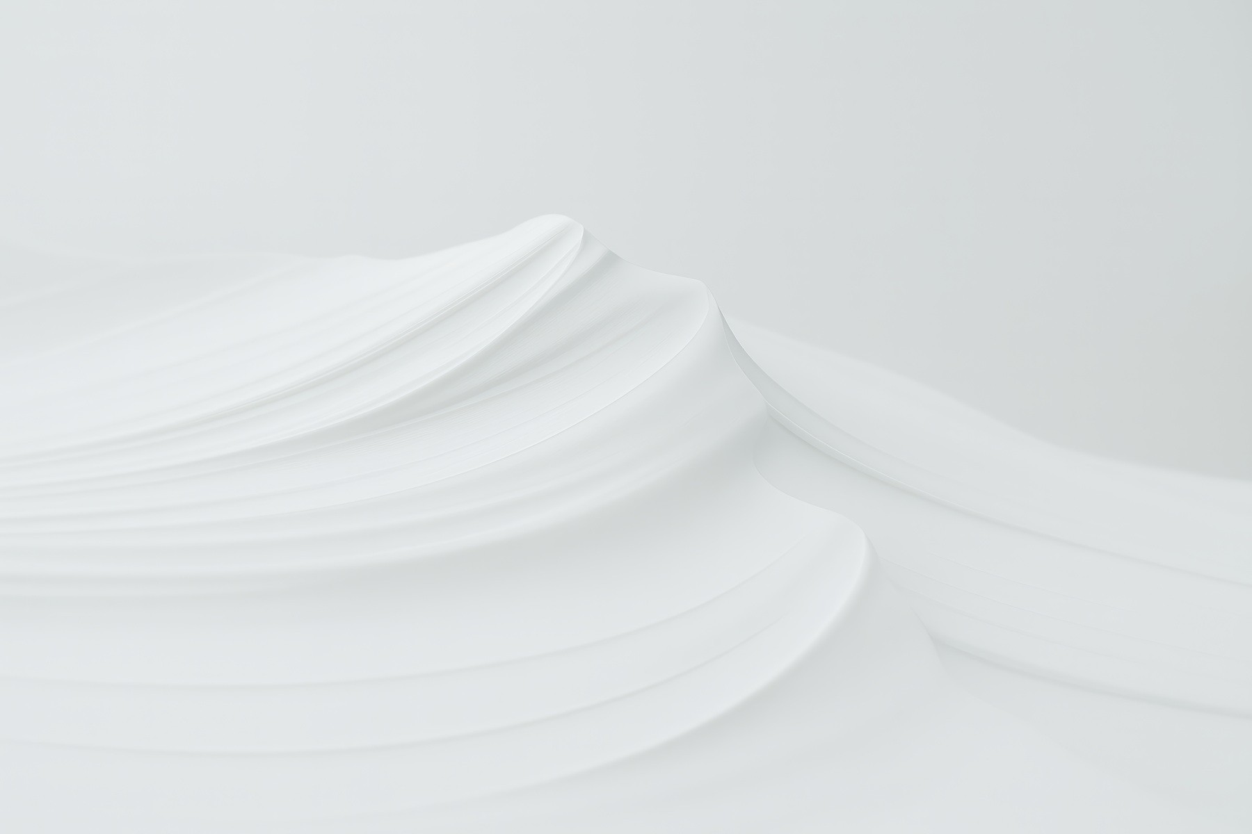 Abstract close-up of smooth white and black layered surface.