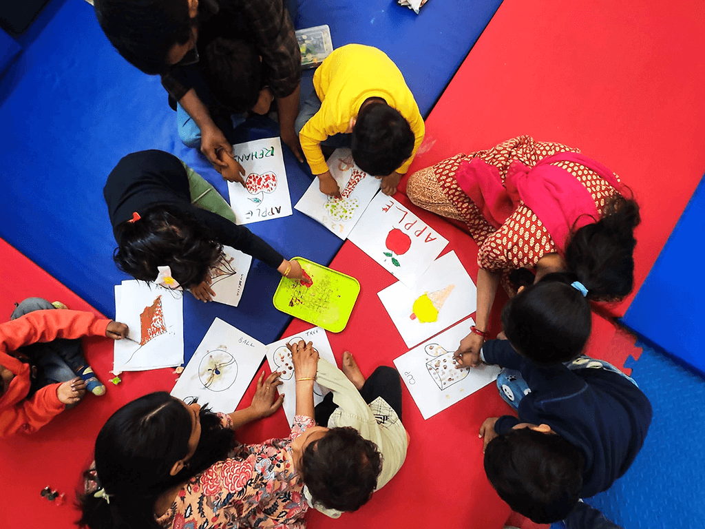 Therapist guiding parent and child during developmental assessment at Blissful Care Center — pediatric occupational therapy Gurugram