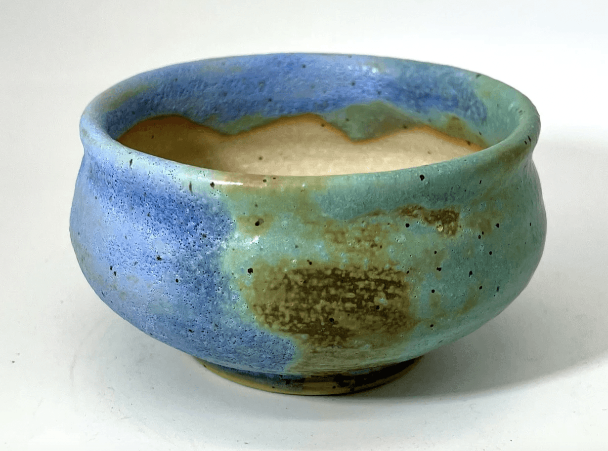 stoneware succulent pot in blue and green with an abstract pattern
