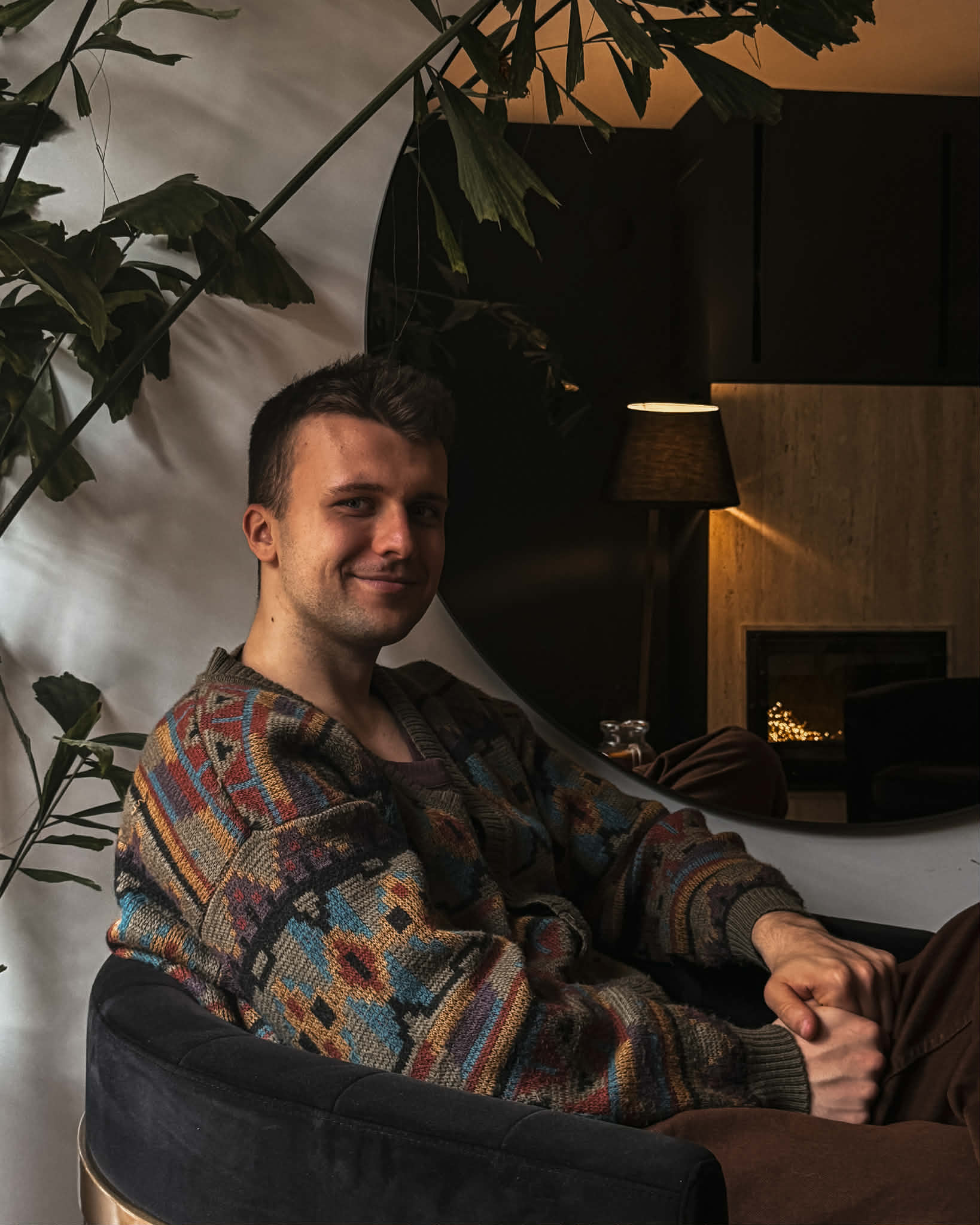 man filming on beach