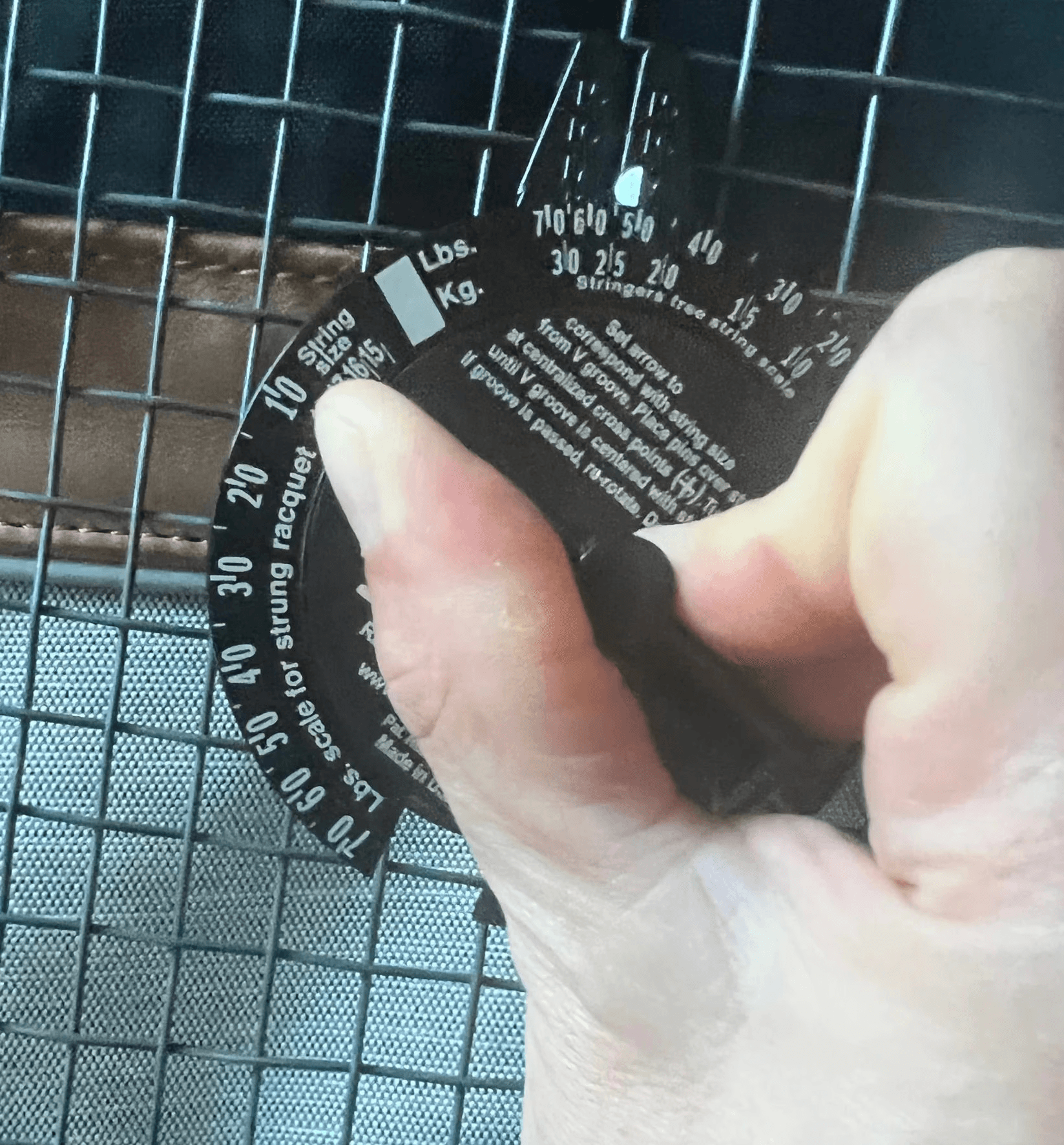 Racket string tension