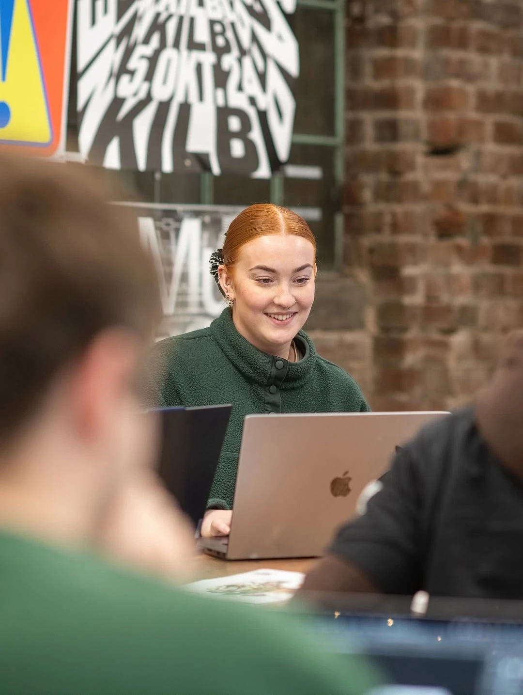 girl using laptop and drinking coffee