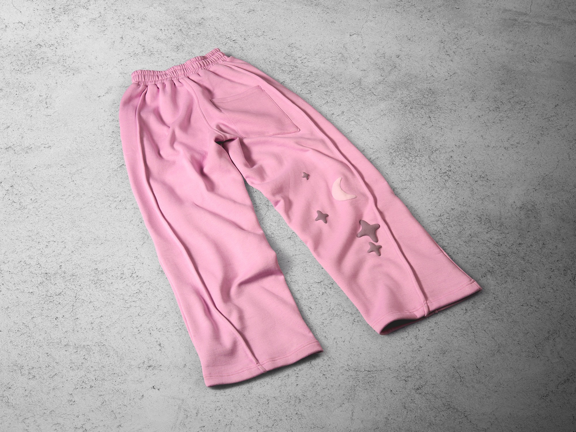 Tuko Clothing pink Dandadan inspired joggers photographer by Matthew Brown (London product photographer).