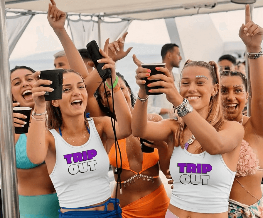 Smiling woman in feathered carnival costume