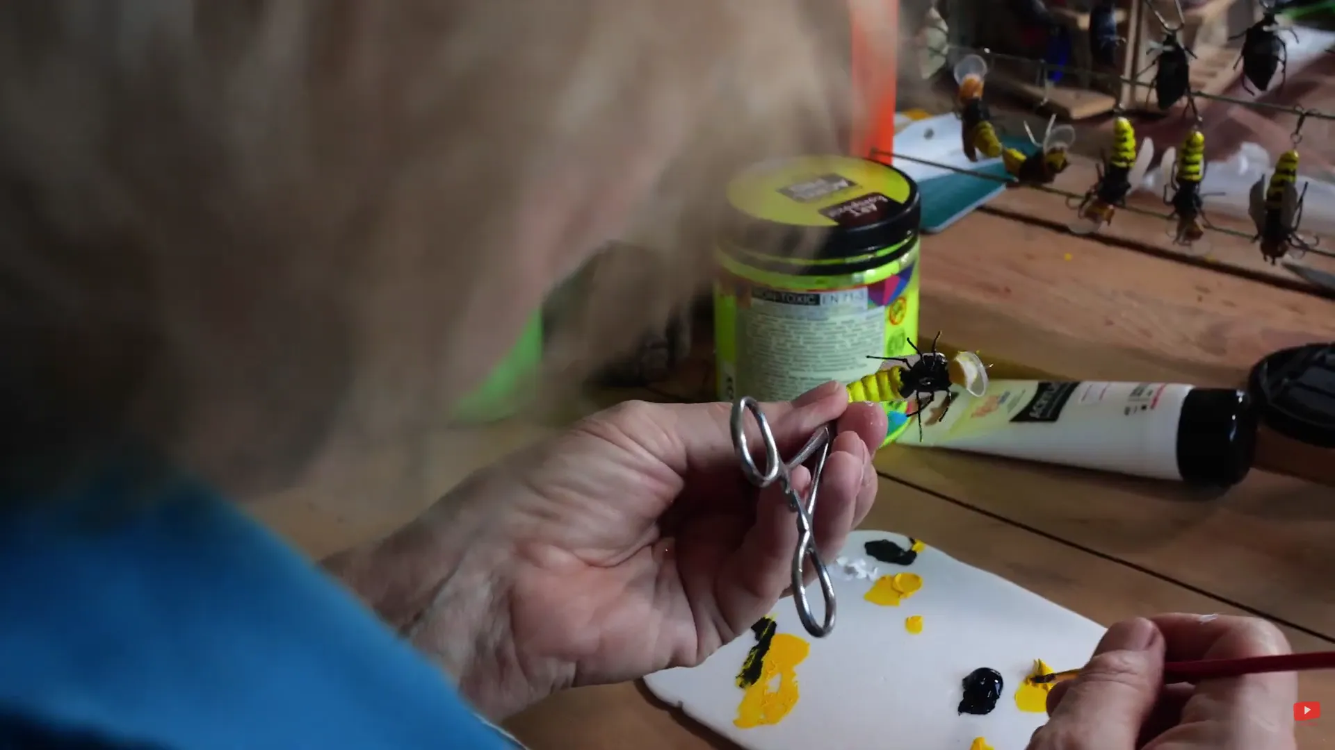 Product video filming focused on the handmade fishing lure production process, capturing close up details to support promotional and marketing content.