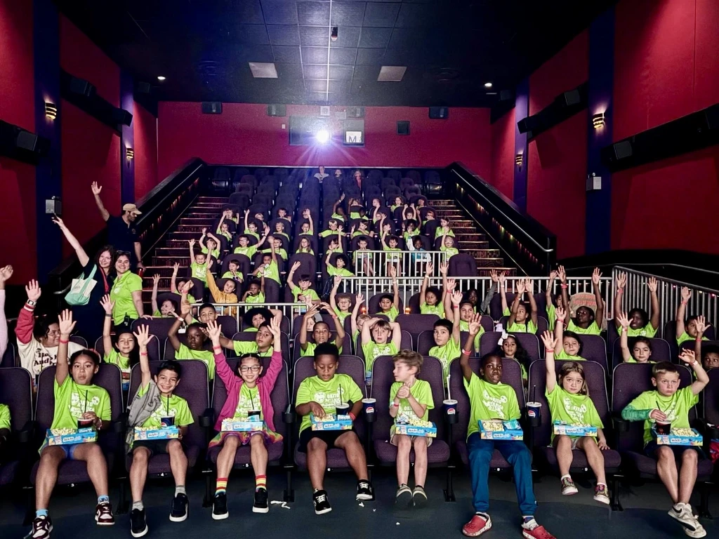 Kids with treats at a movie theater.