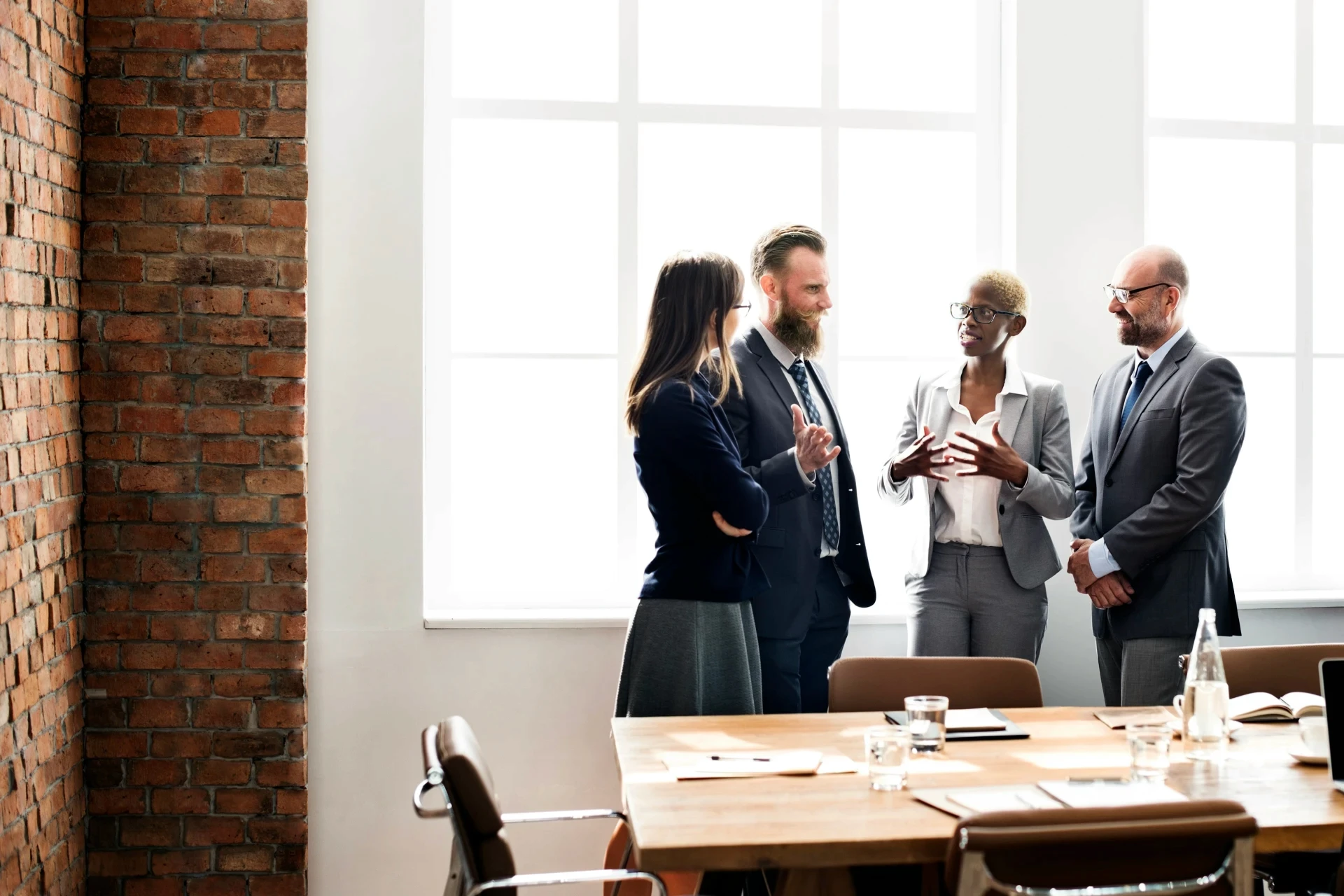 Management team discussing in a room