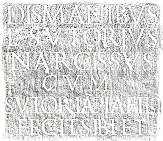 A piece of paper with text copied from a wall with a crayon.