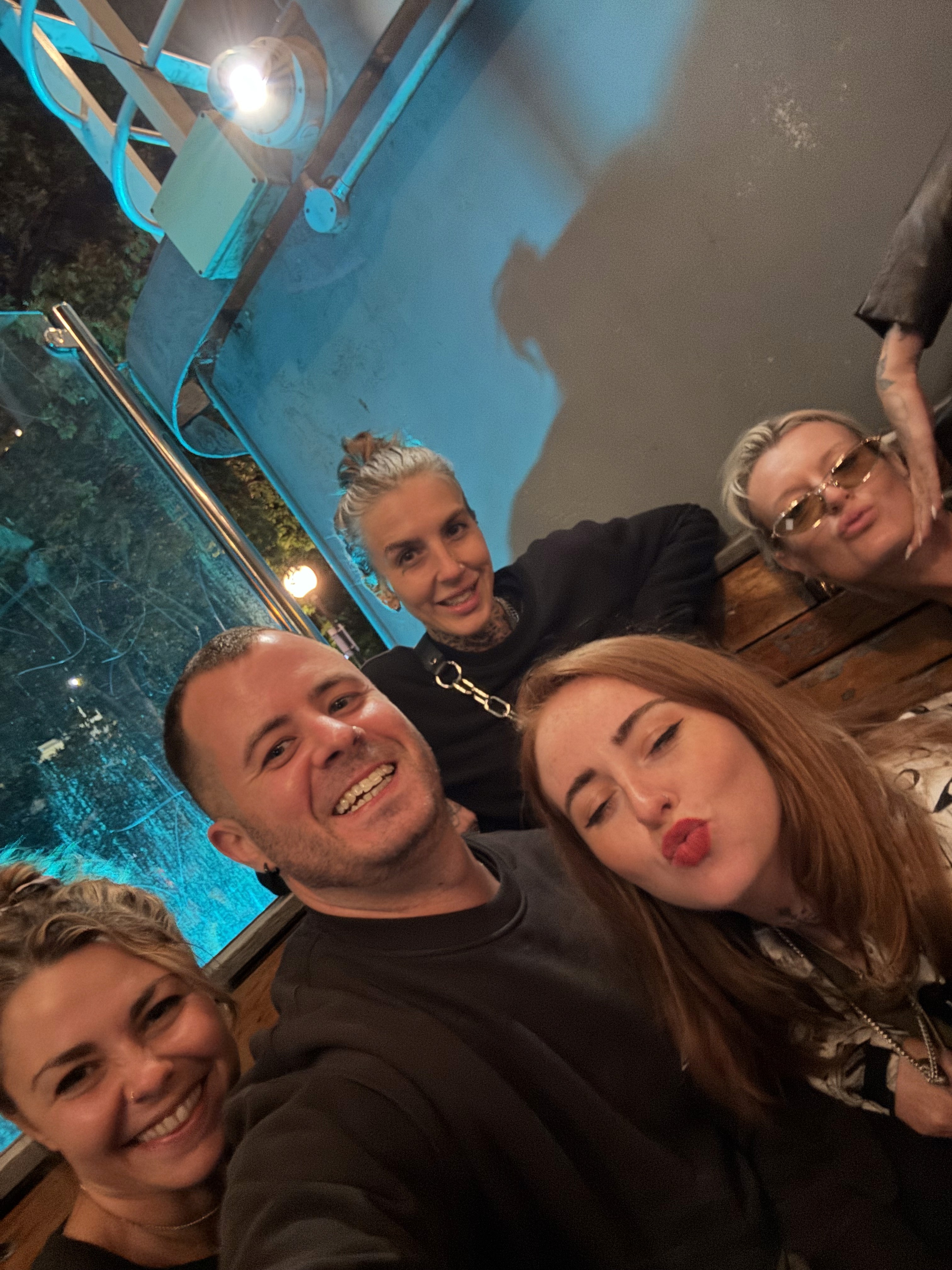 The Good Times Tattoo - Emily Rabbit, Jodie Mae, Tash and Max crew taking a group selfie with Whambam Tattoo on a night out during Bristol Tattoo Convention 2026