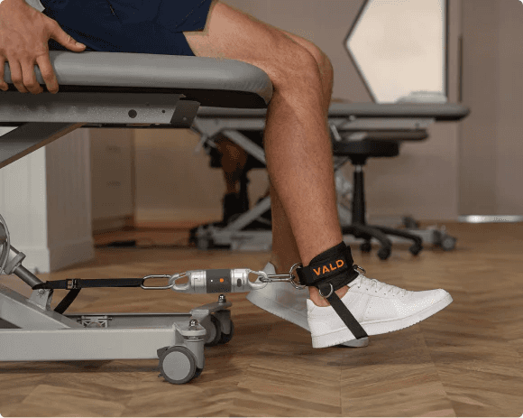 patient using a VALD product stretching ther leg