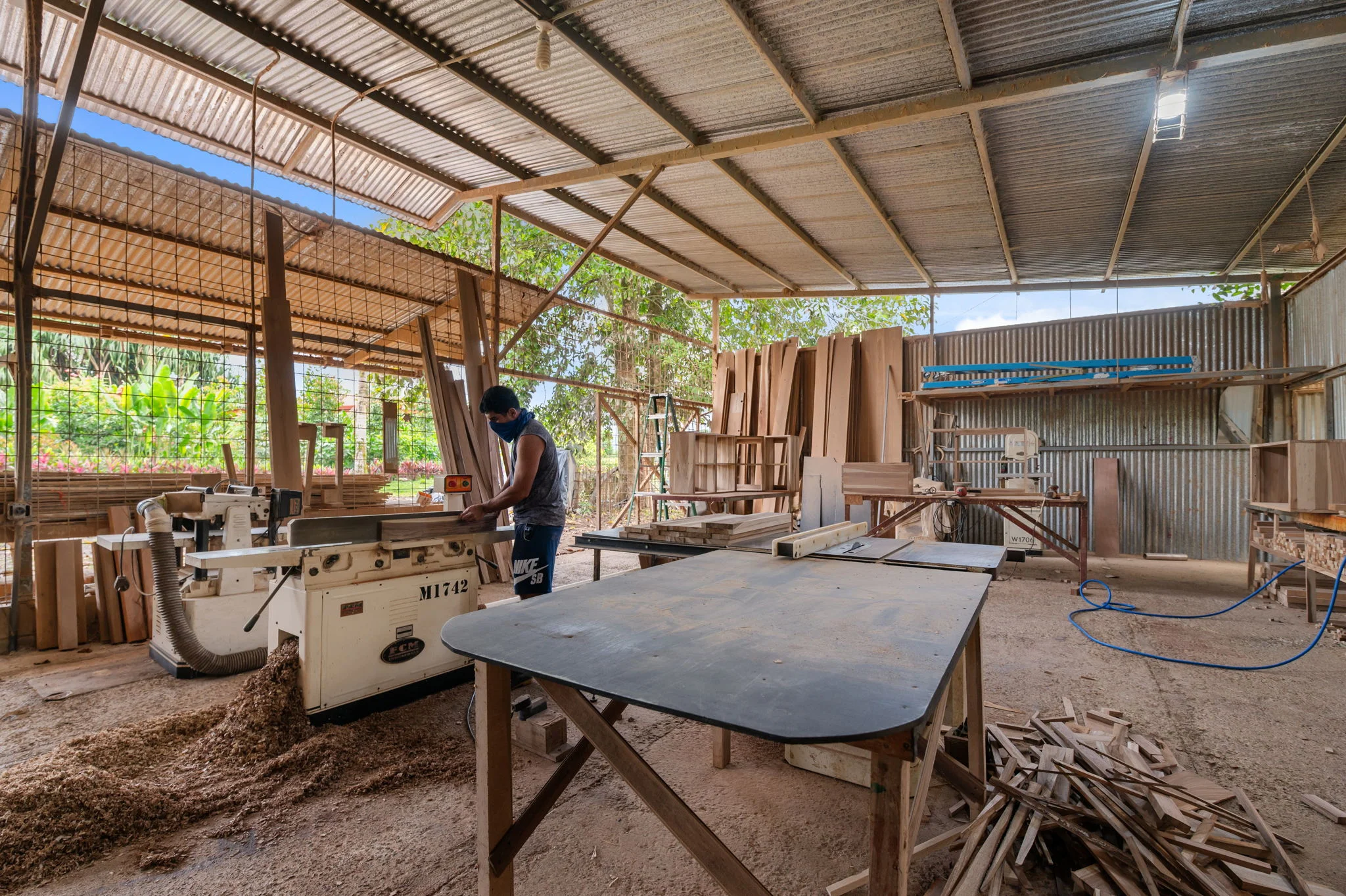 A craftsman making materials for a villa build