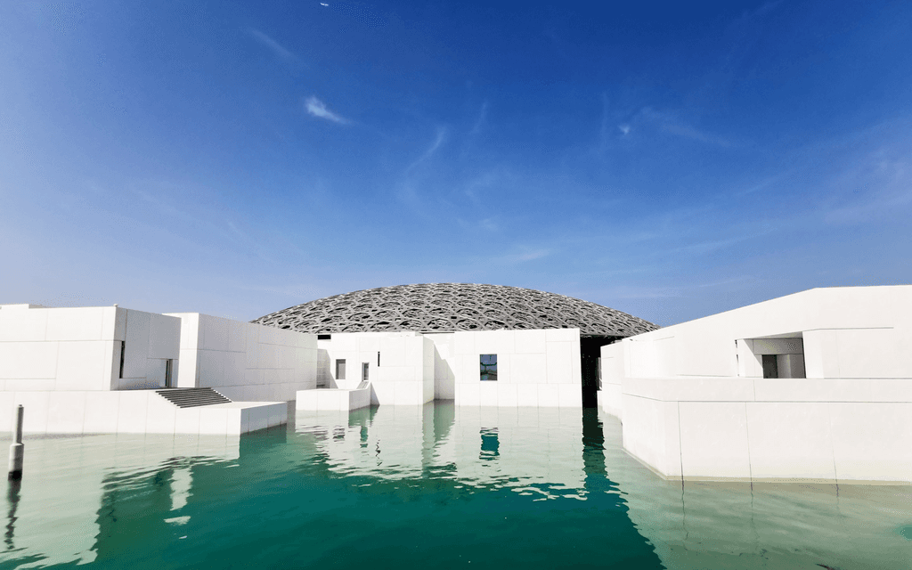 Modern architecture of the Abu Dhabi Museum at Mamsha Al Saadiyat, showcasing sleek lines and innovative design.