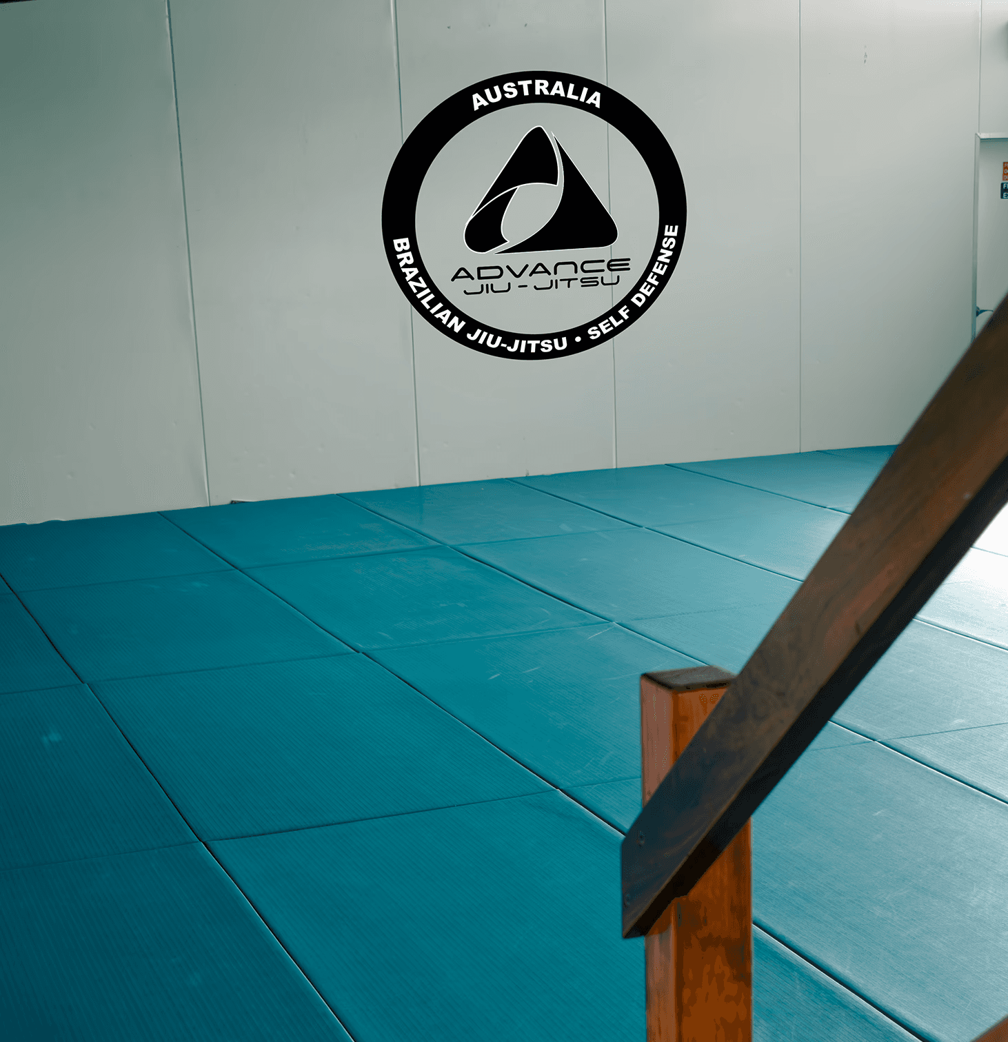 View of blue training mats inside the Gracie Sydney dojo