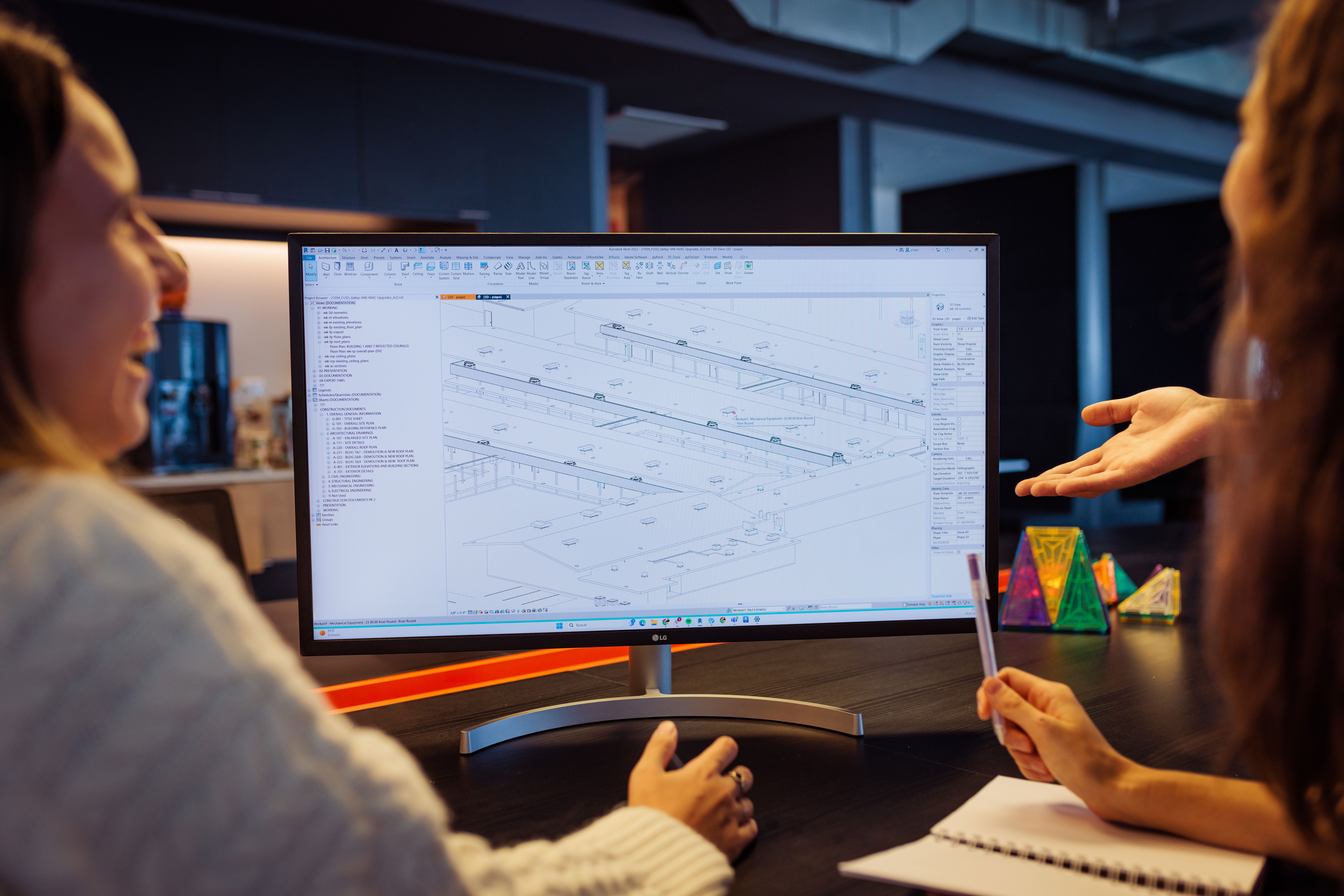 coworwers discussing a Revit project