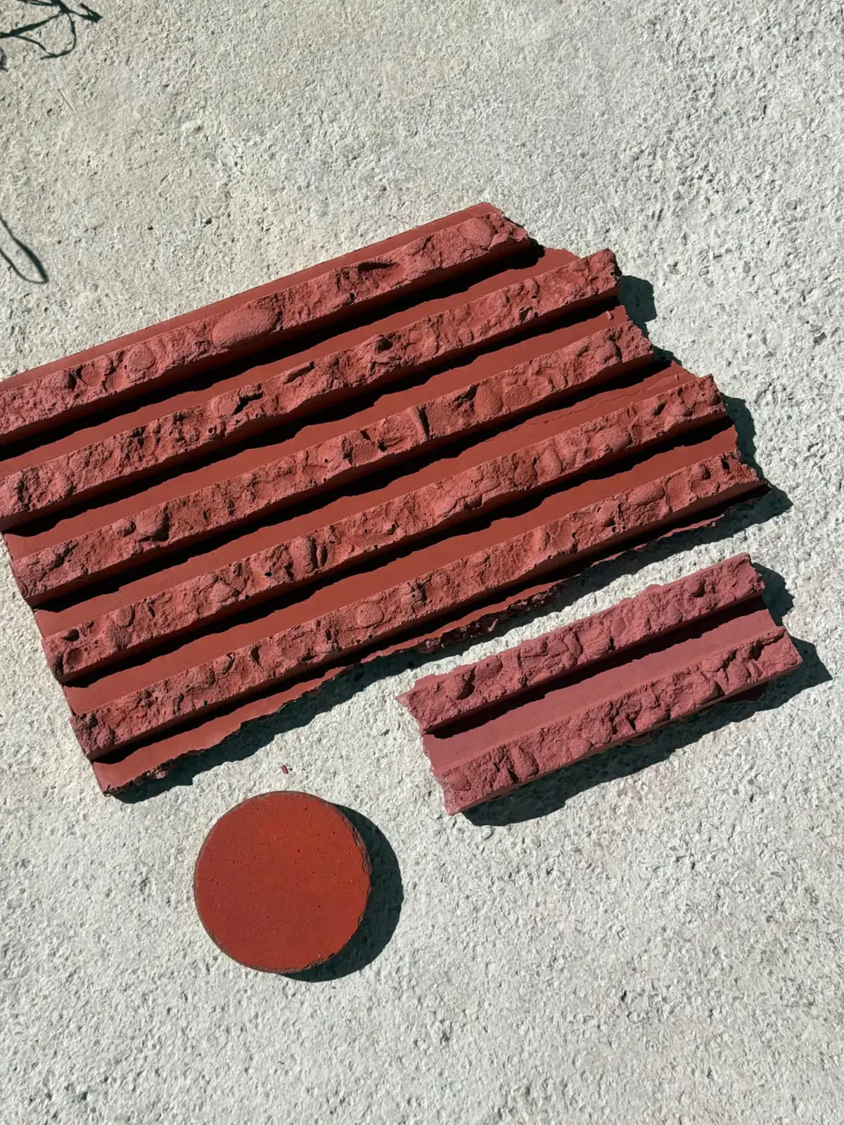 Research and development: red textured material samples