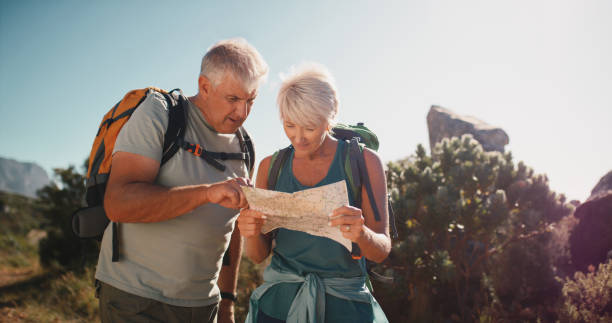 retiree couple reviewing map