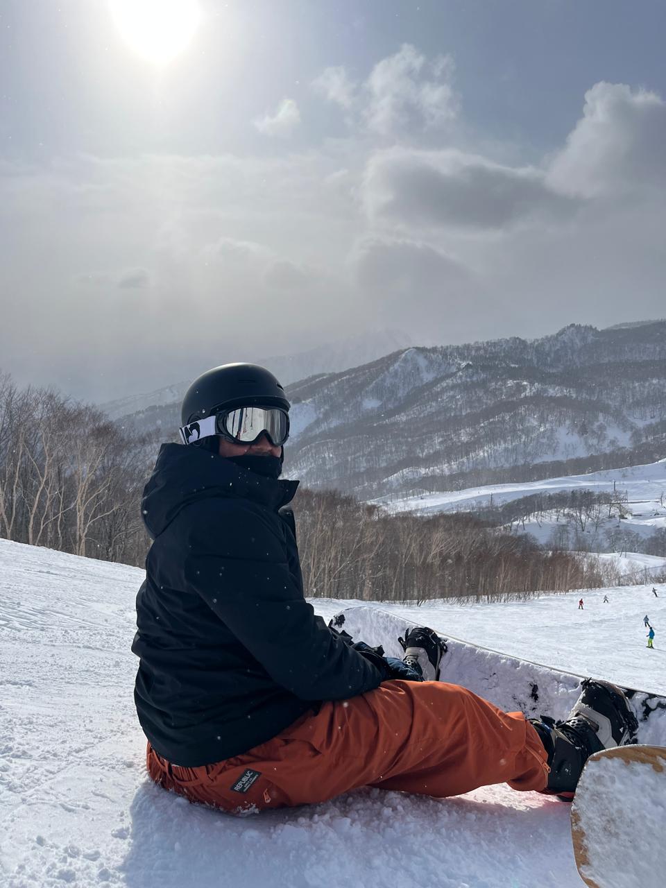 A man with snowboarding
