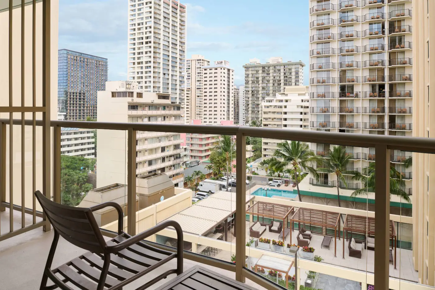 standard hotel room balcony view of buildings in the circle hotel waikiki
