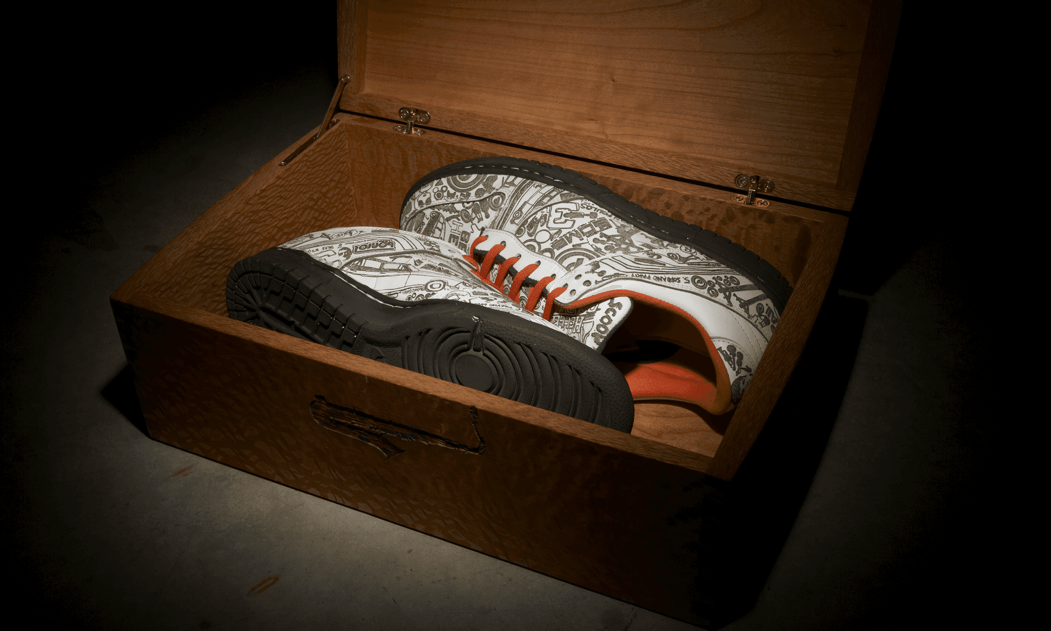 custom lasered nike dunk shoes inside a custom, lasered wooden shoe box