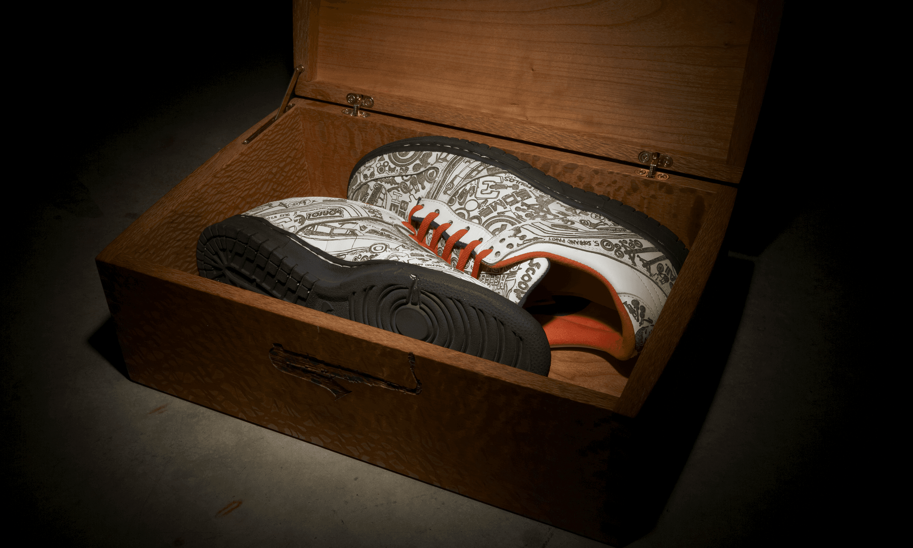 custom lasered nike dunk shoes inside a custom, lasered wooden shoe box