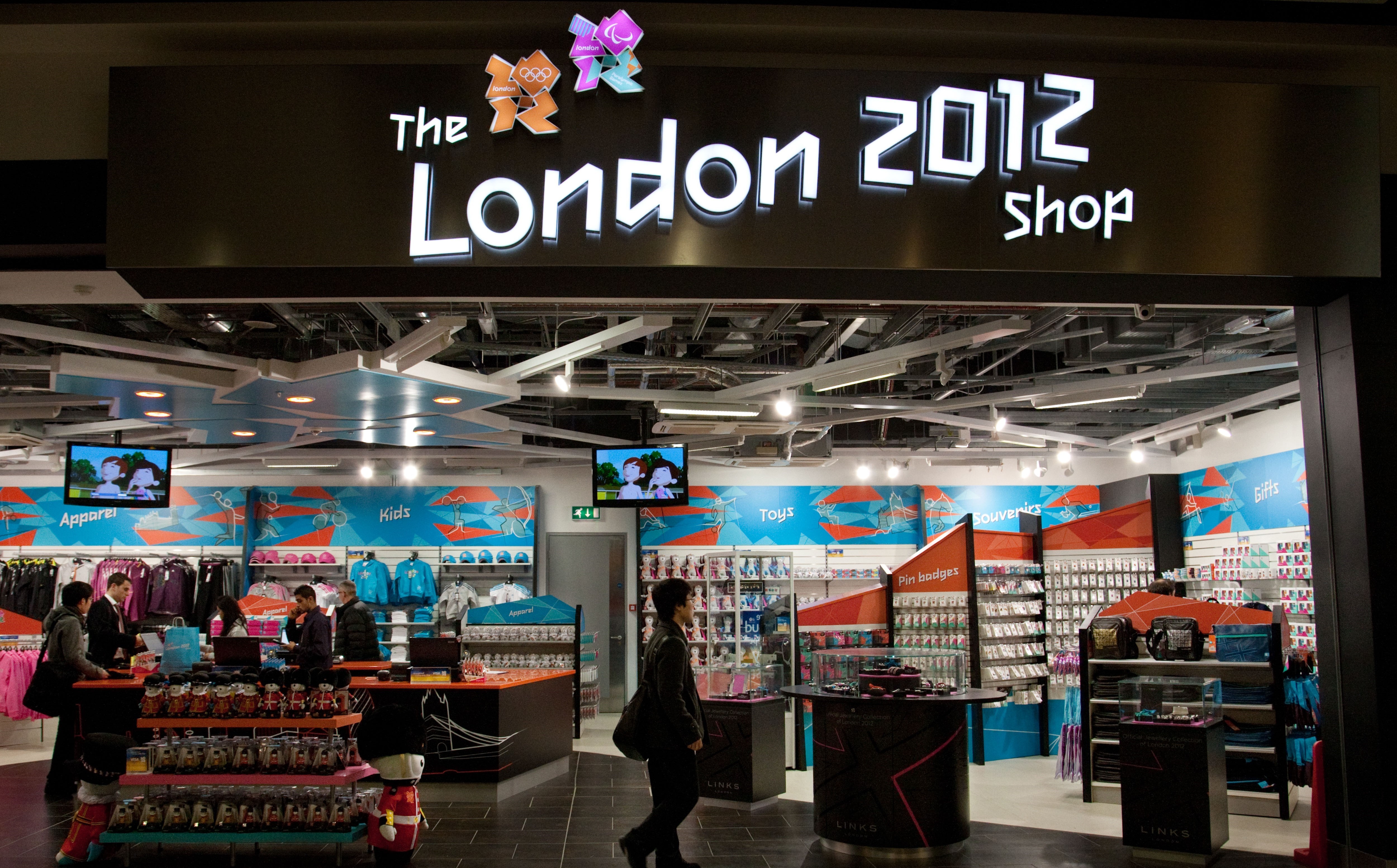 London 2012 Olympic shop frontage with illuminated signage, point-of-sale counters and retail display systems
