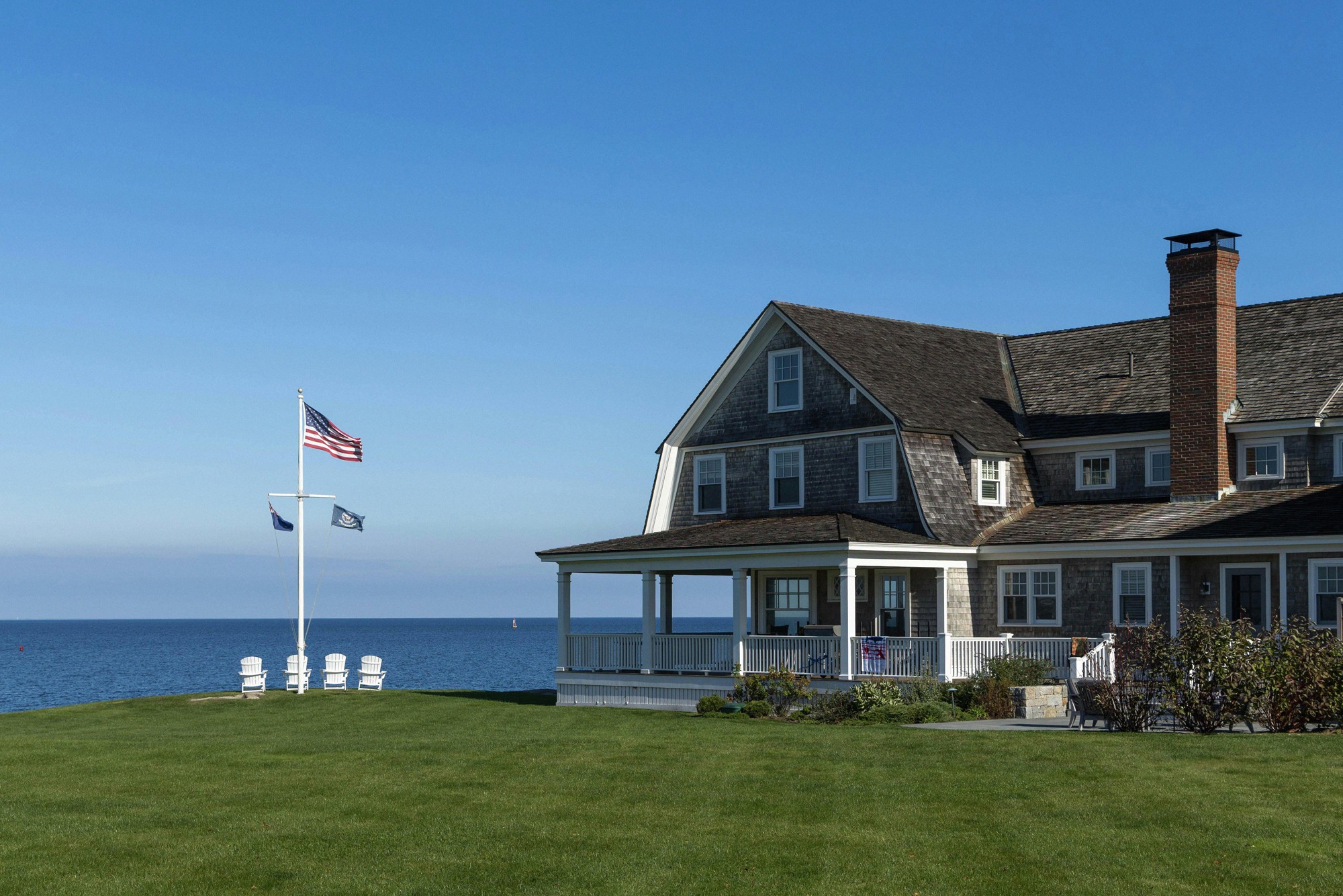 Modern seaside house with freshly installed shingle roof by Shingle to Slab