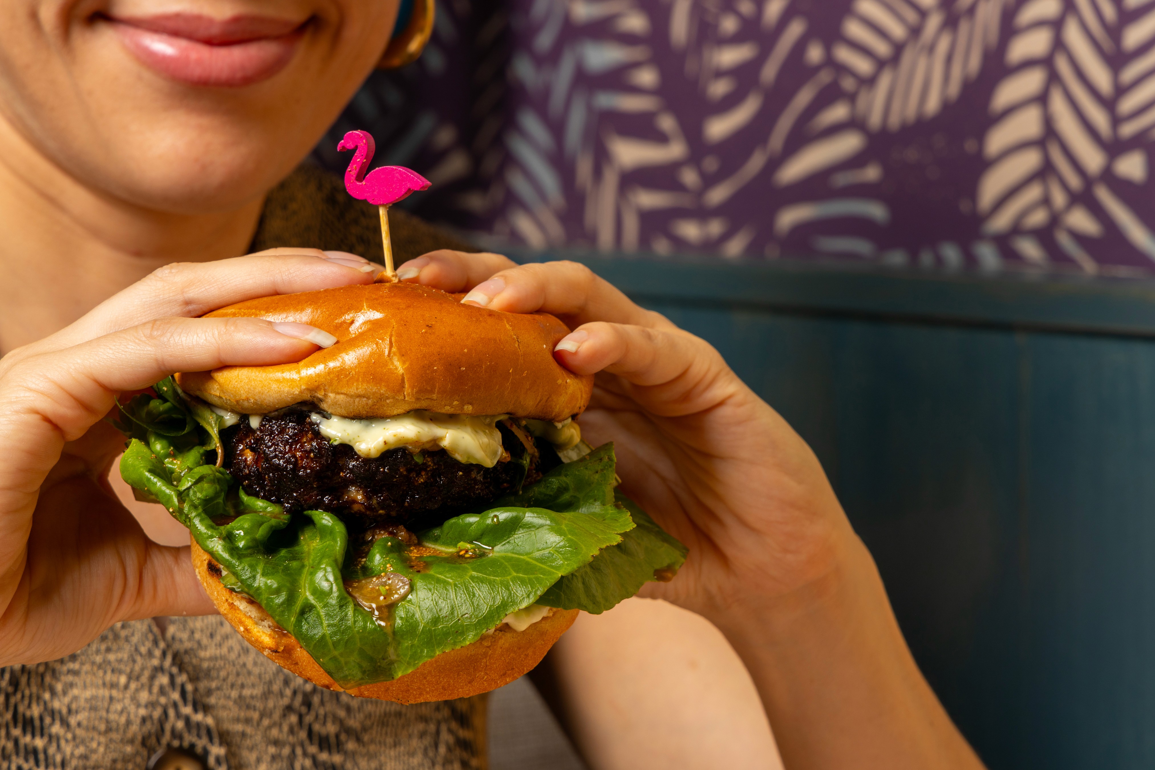 People celebrating, red stickers floating in the air