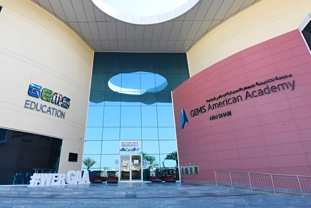 The entrance to the Abu Dhabi Education Academy, located in Al Seef, showcasing modern architecture and welcoming design.