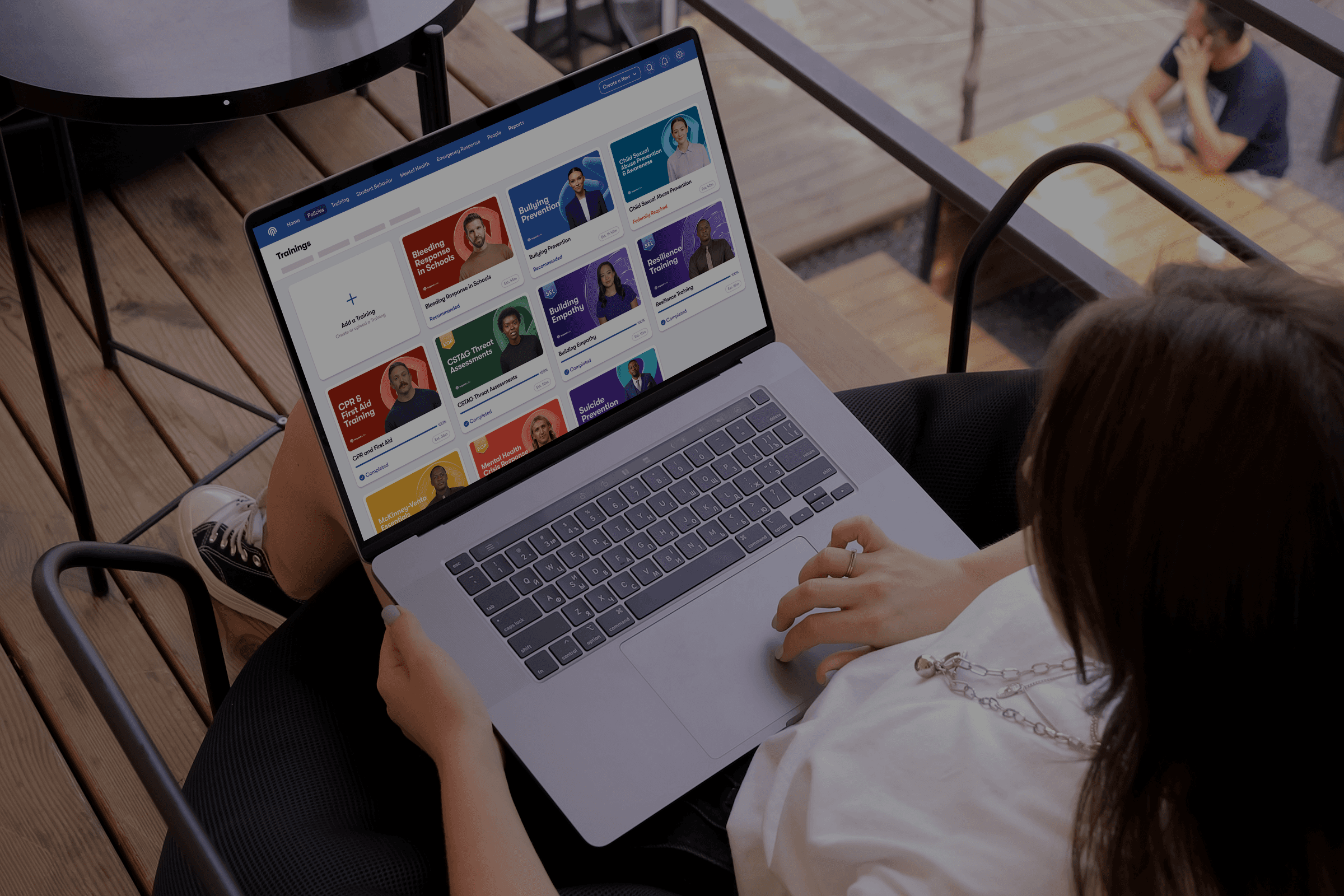 Image of a mockup of Impact Suite software dashboard. It shows the user the number of concerns and cases, it shows a concerns timeline, it lists the top students who need personal care, and it gives details into who has/has not compnleted safety trainings and policy acknowledgements.