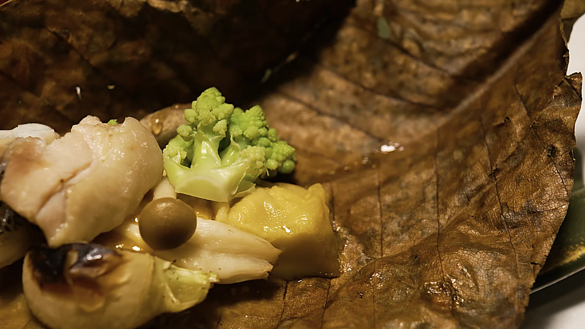 Small dishes served on a leaf at Kurokawa Onsen, romanesco and chestnut among them