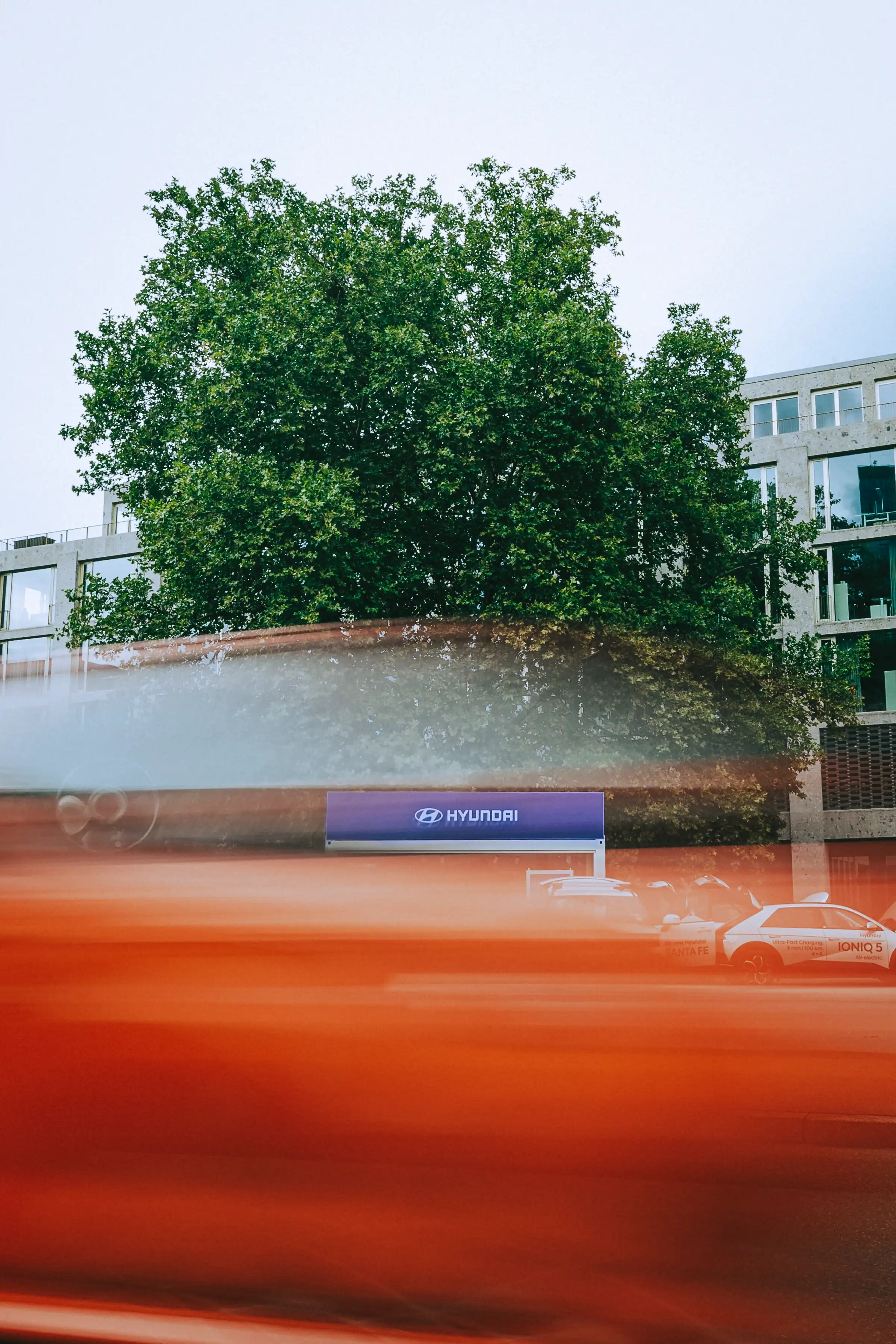 Streetside billboard with flyposters of the Batch.Works brand and illustrations