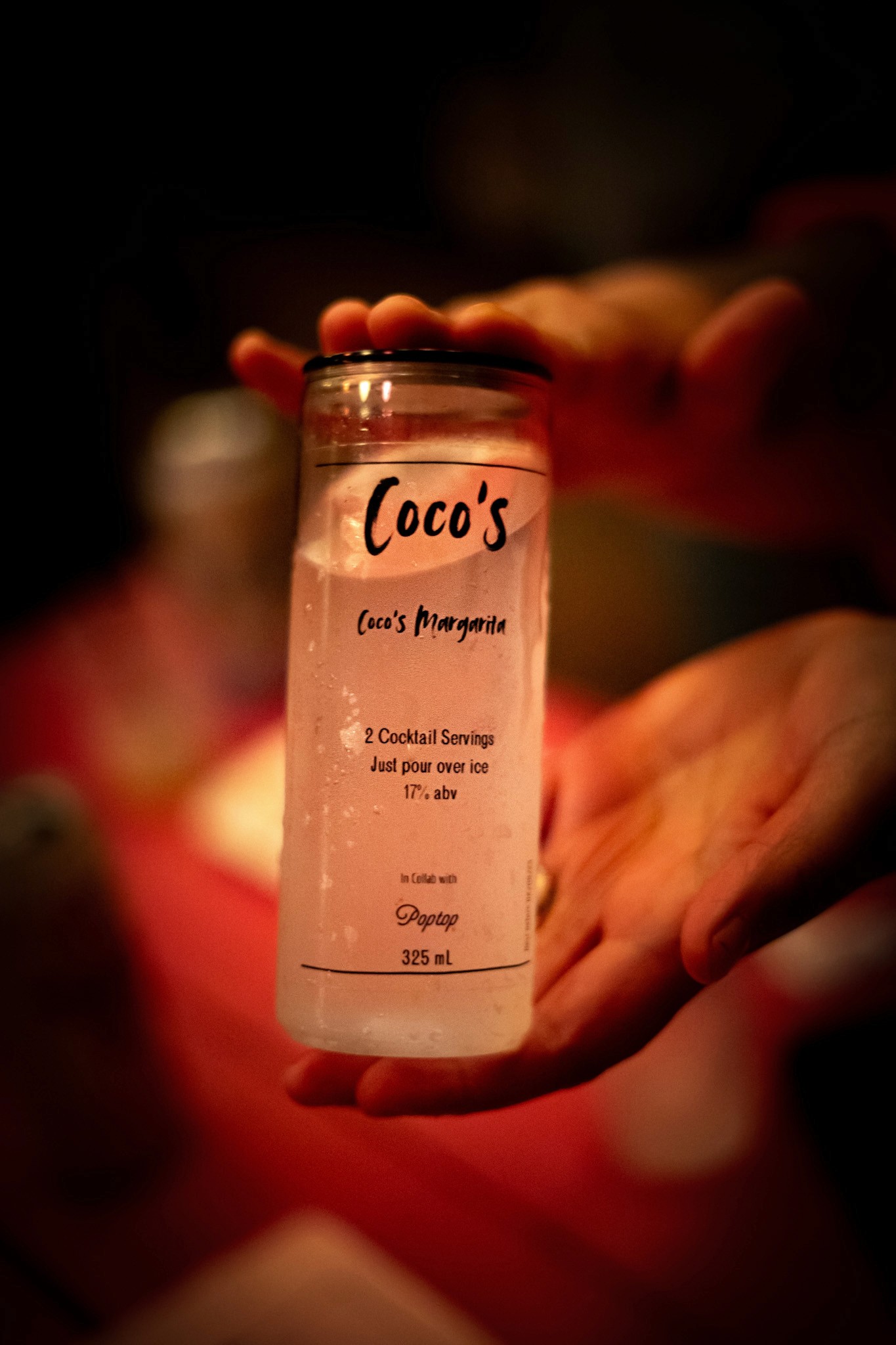 clear can with coconut margarita