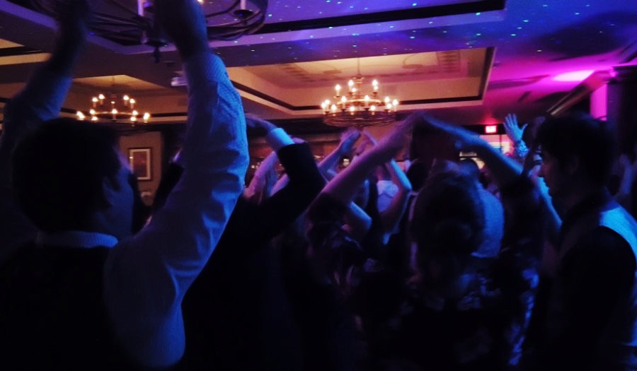 Wide angle of guests dancing at a Muskoka venue