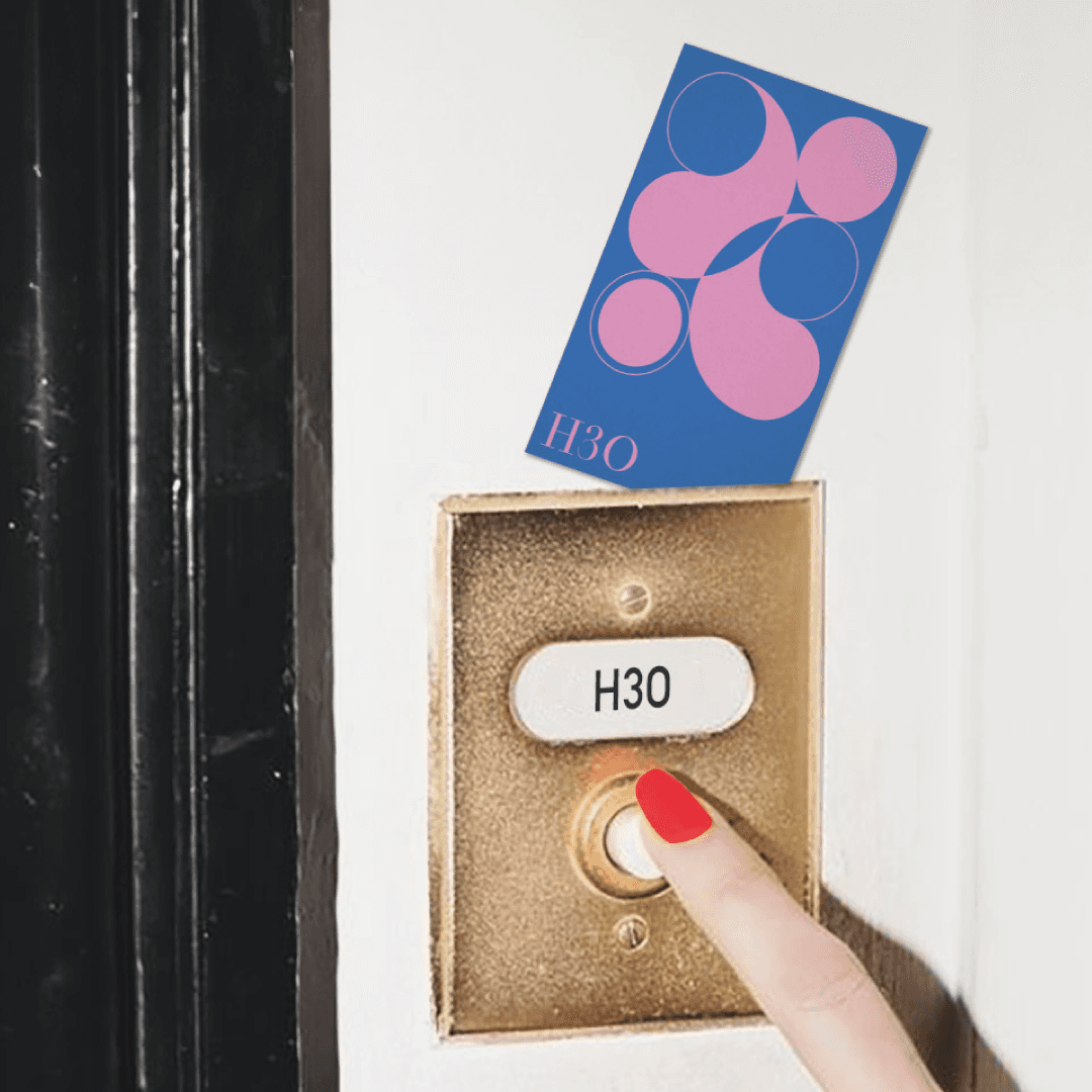 H3O logo card displayed next to a metallic nameplate, suggesting branded signage or mailbox application.