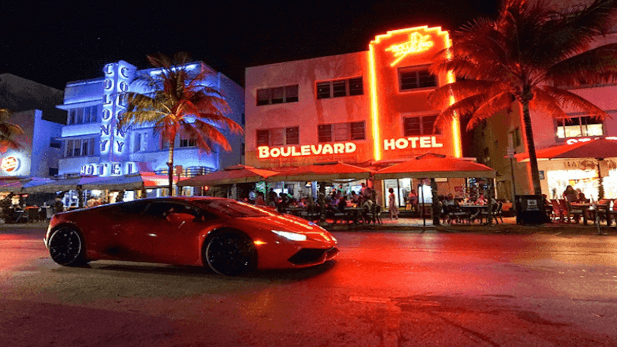 A sports red car in Downtown Miami