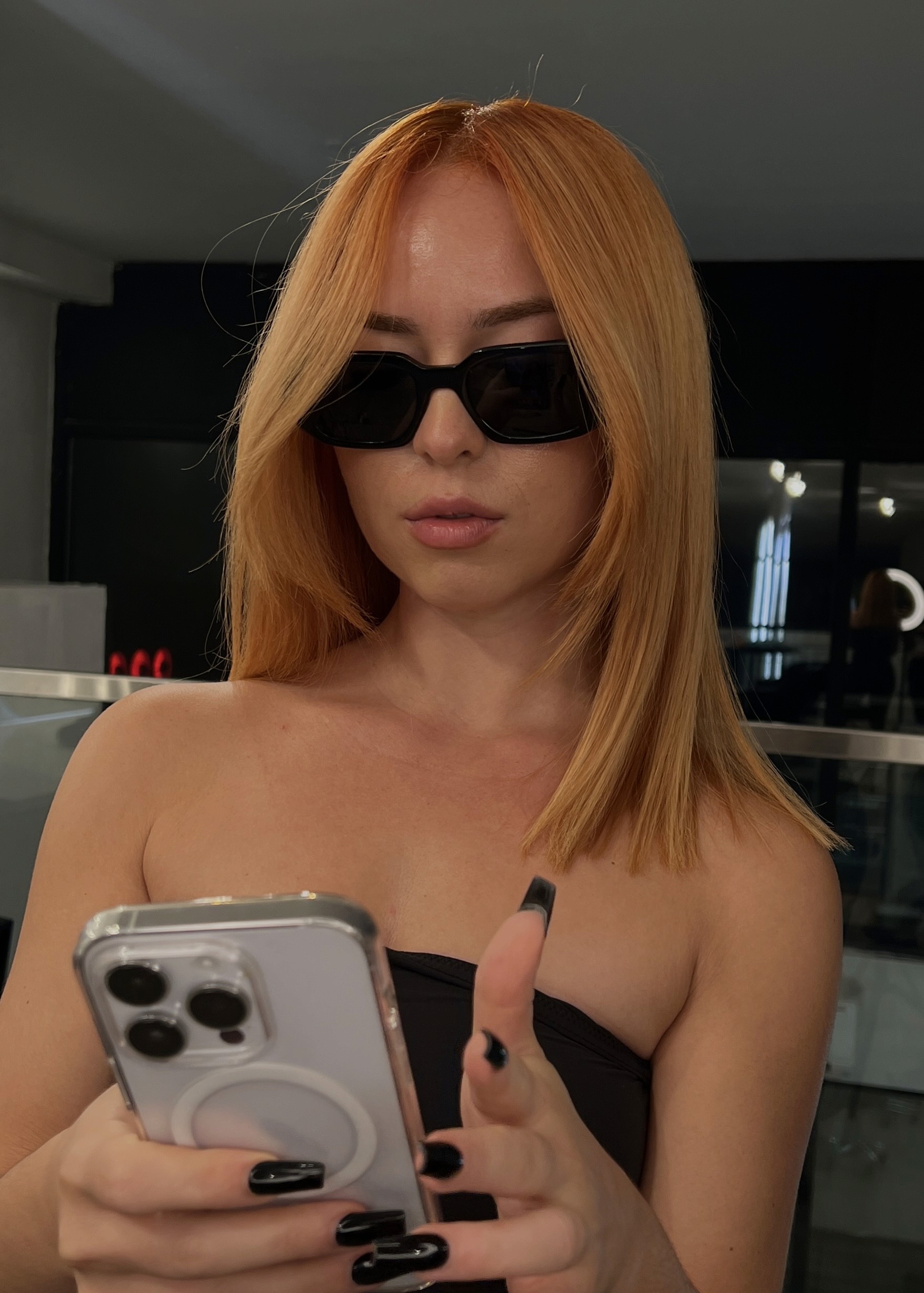 Copper bob haircut with rich red tones, stylish short haircut, red hair specialist at Que Linda NYC