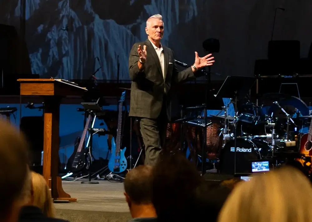 Wide shot of Pastor Brad preaching