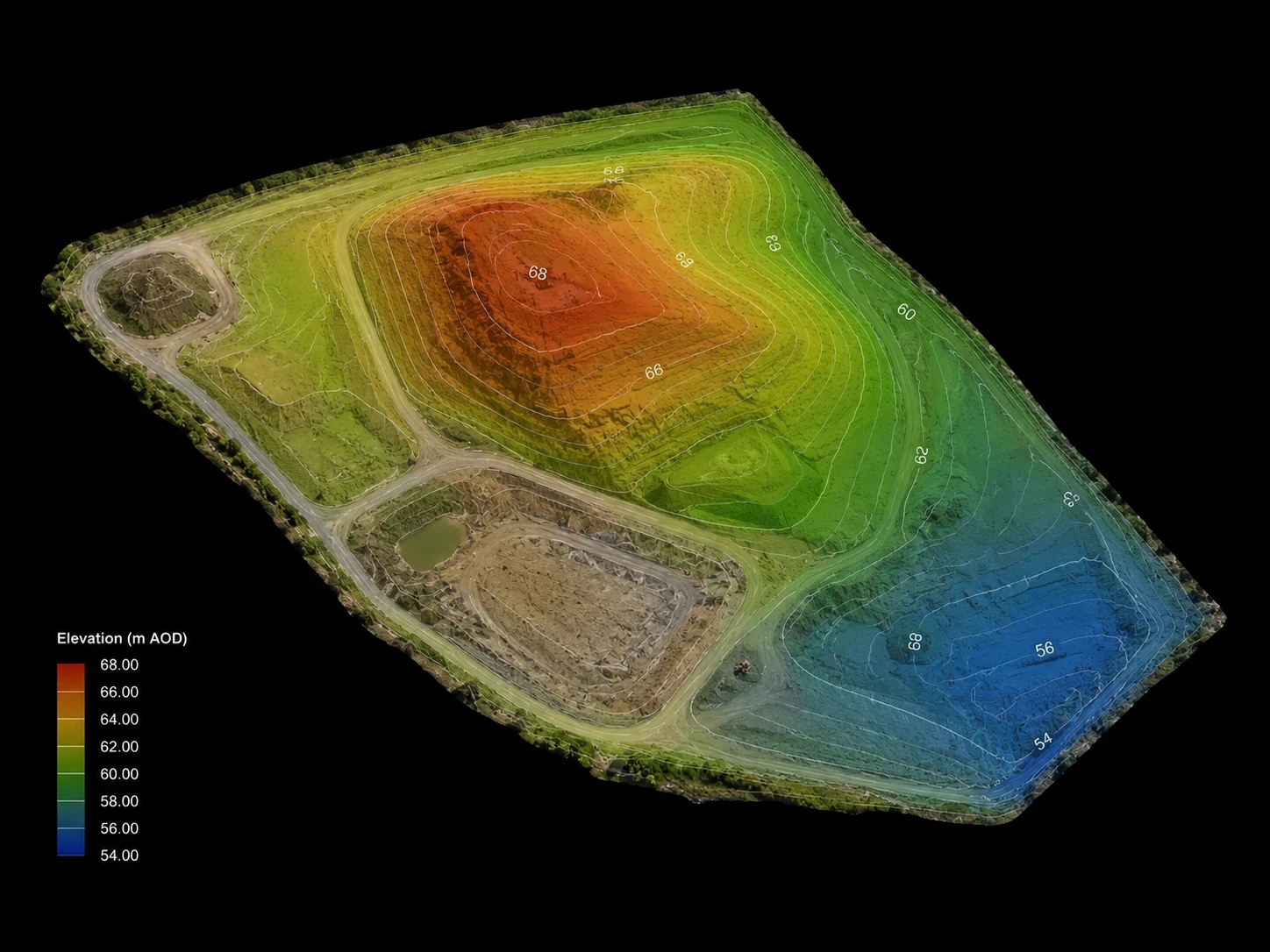 High-altitude aerial view of a UK construction site showing earthworks and access roads