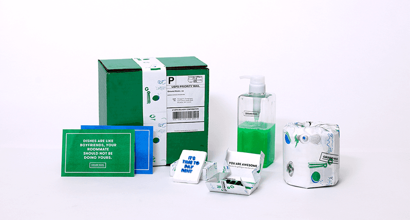 A set of green and blue designs put on boxes, papers, soap bottles and calling cards.