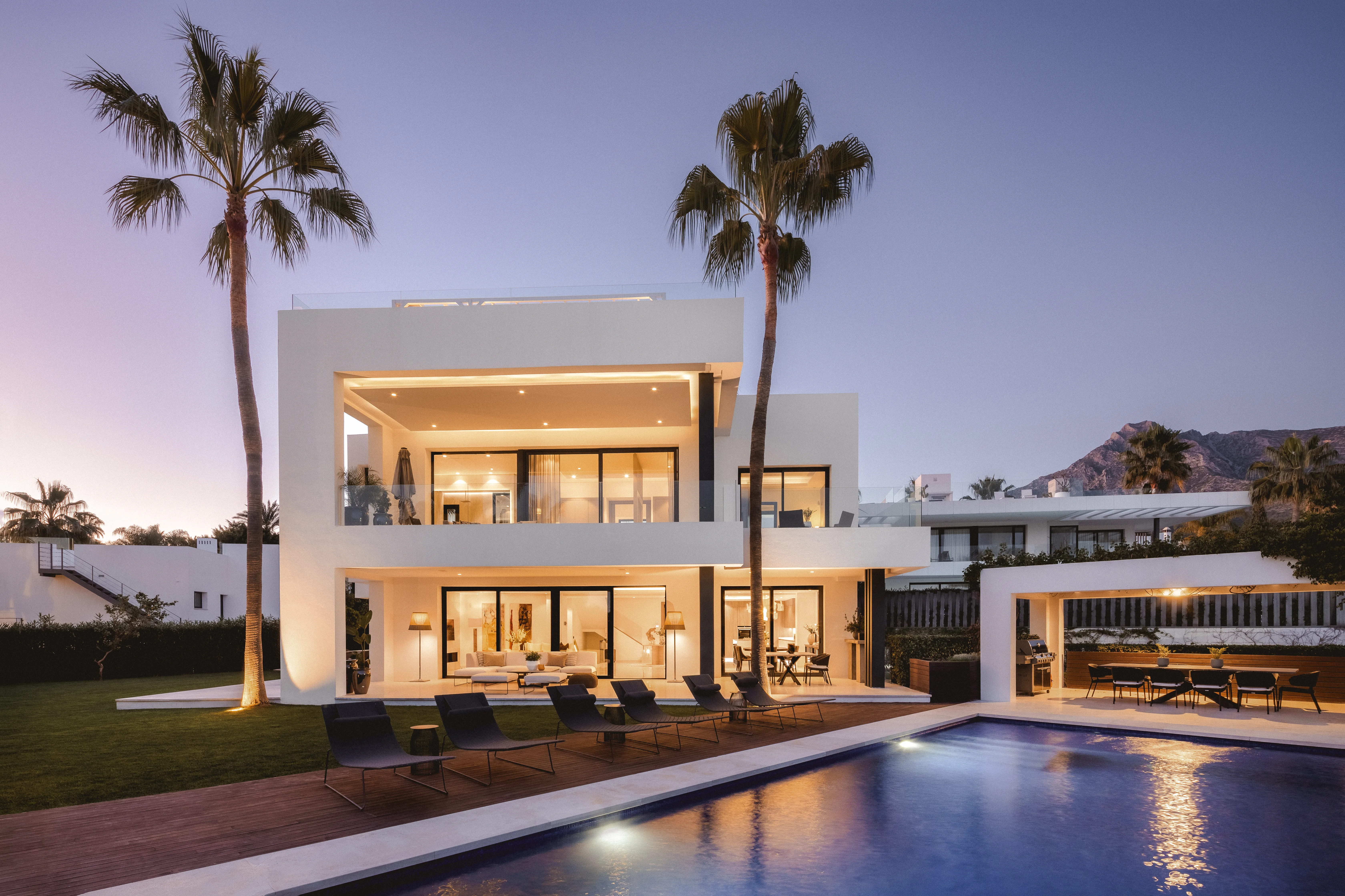 Luxury villa styled with curated furniture and contemporary outdoor living spaces.