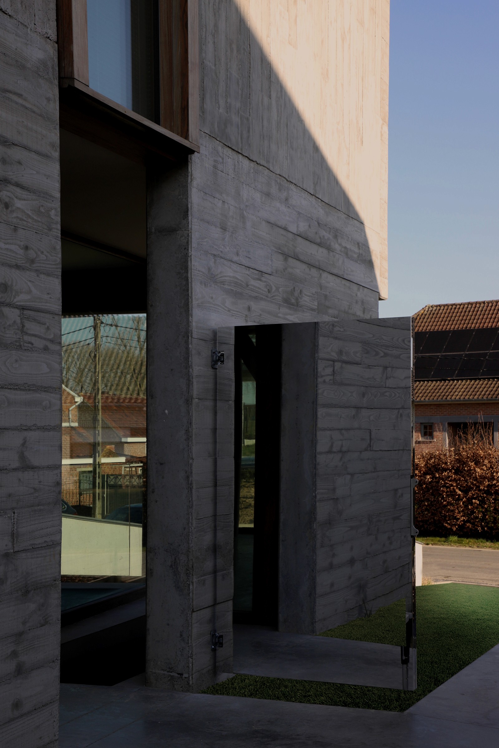 Belgian architect-designed home with concrete, wood and minimalist geometry